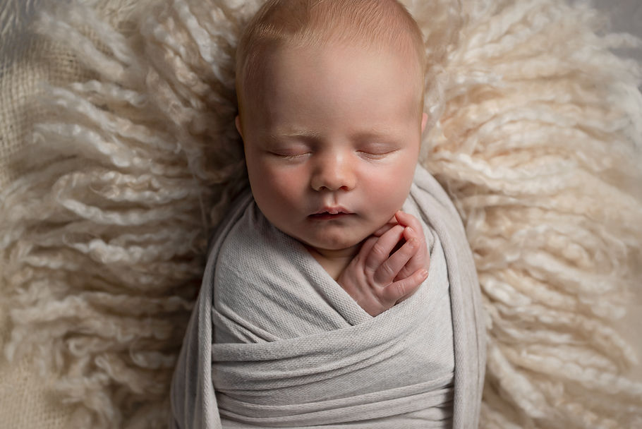 Angelic image of newborn baby boy at his portrait photoshoot Lisburn Northern Ireland